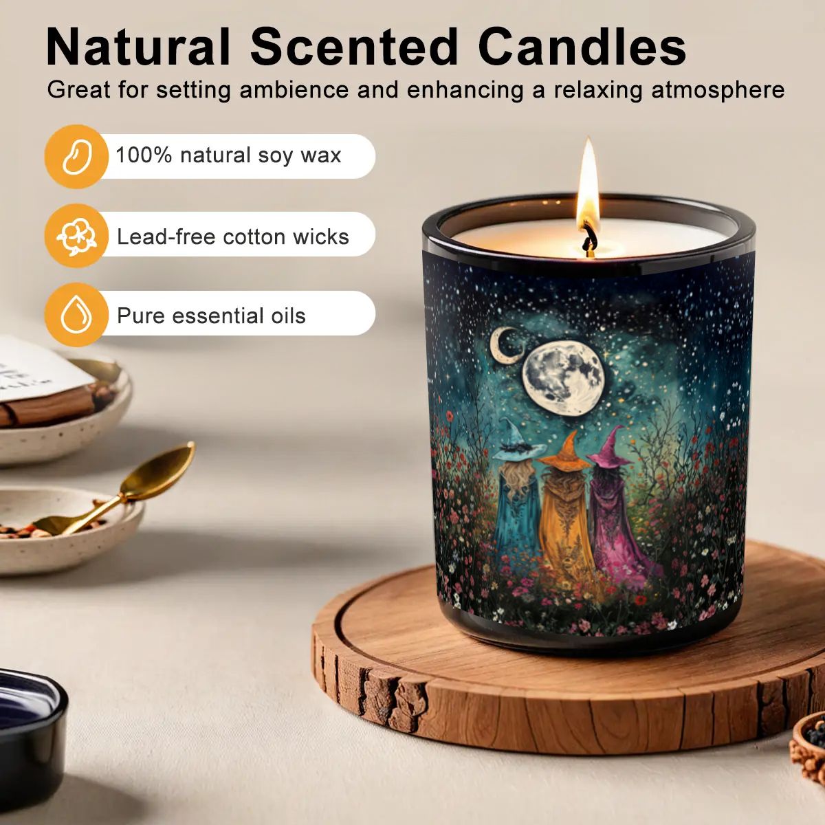 Decorative candle with witches and moon design on a wooden coaster, surrounded by small bowls and a spoon.