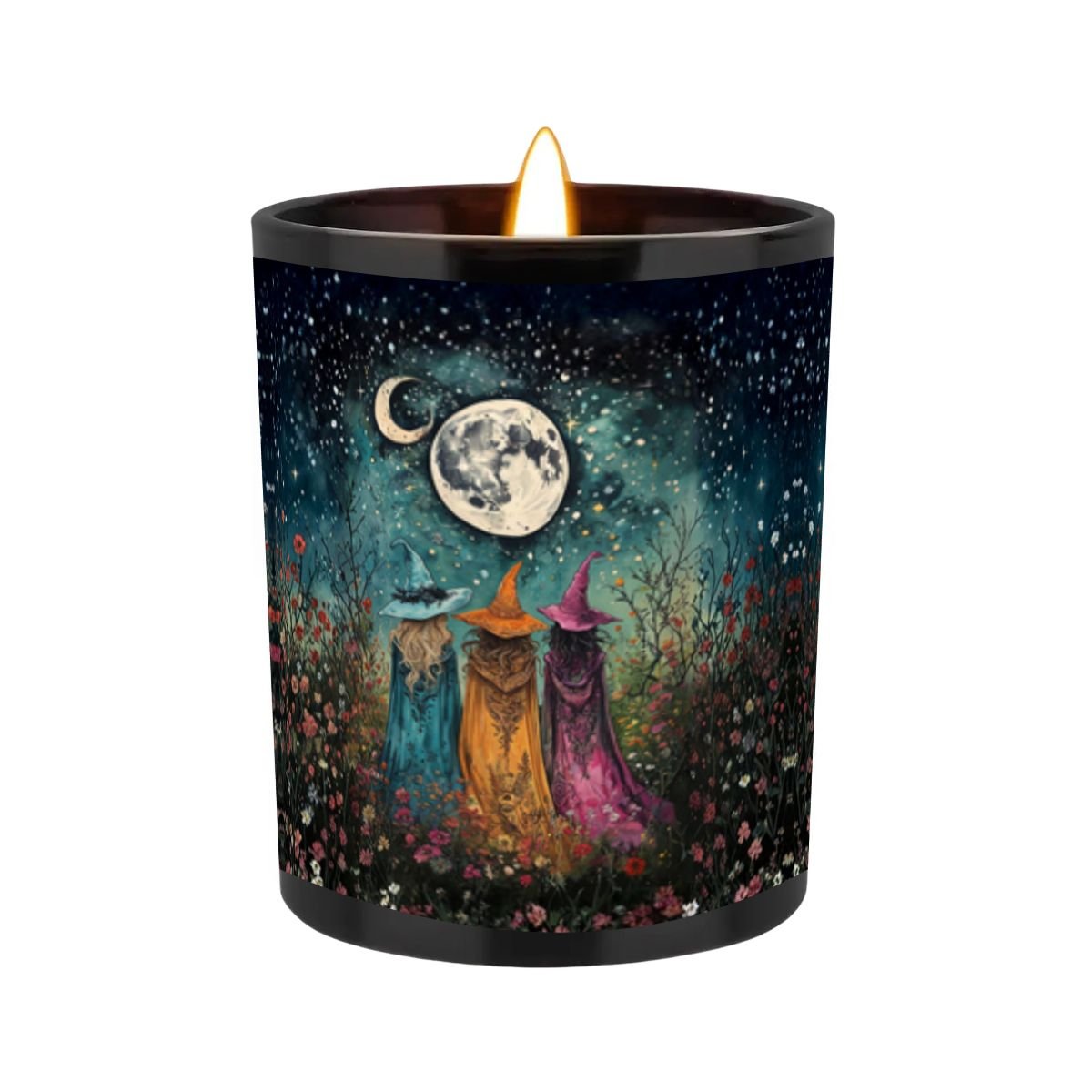 Candle with a decorative design of three witches under a moonlit sky on a white background