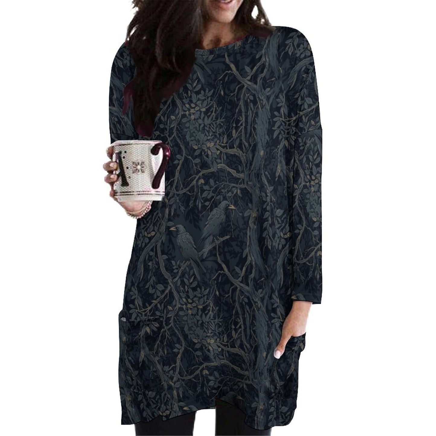 Woman wearing a dark floral patterned dress holding a mug on a white background