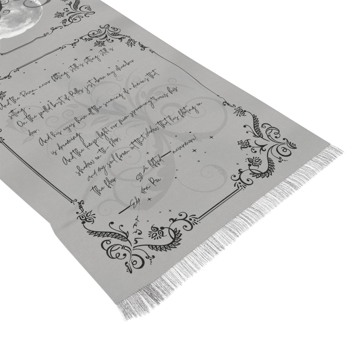 Gray scarf with black text and decorative patterns on a white background