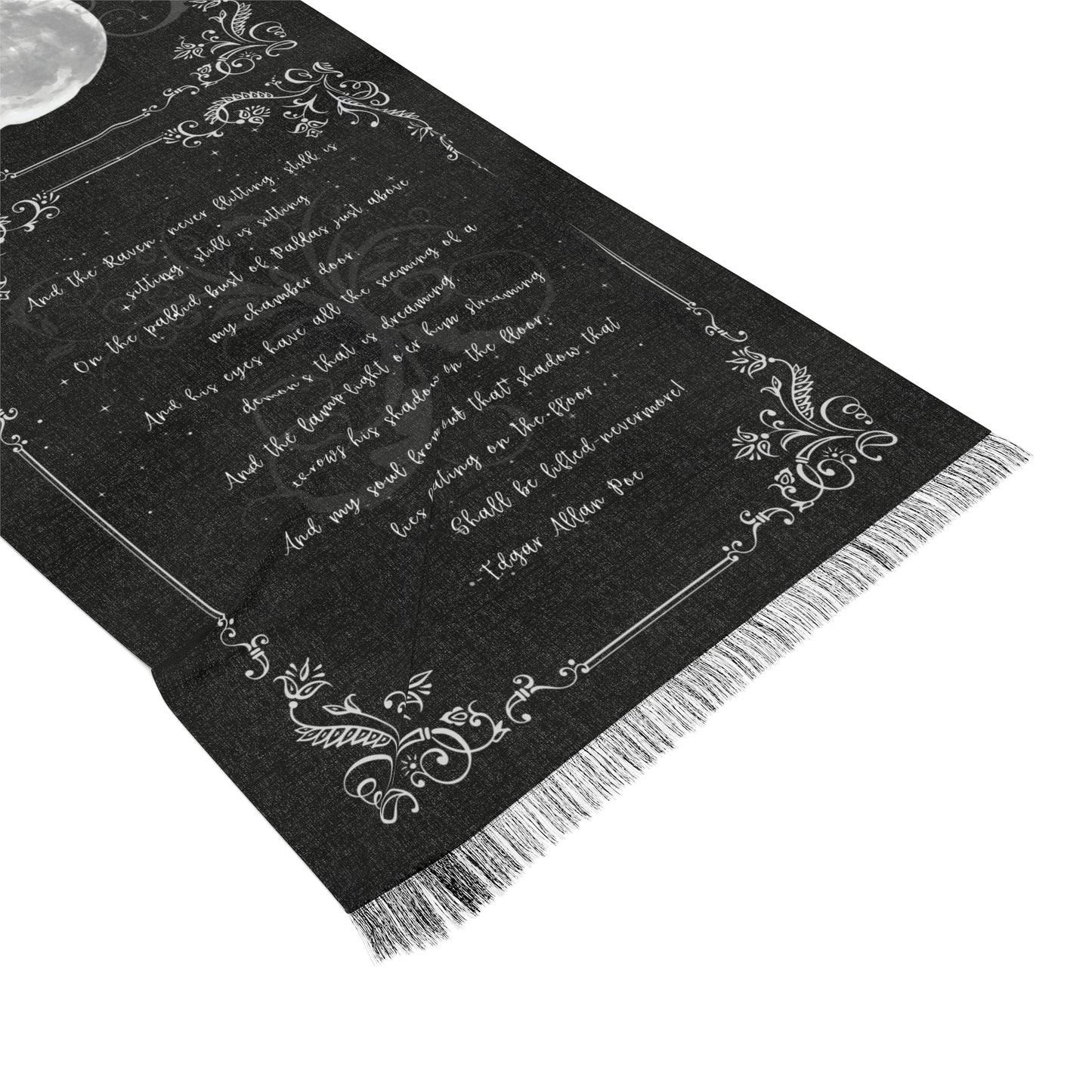 Black scarf with white text and decorative patterns on a white background