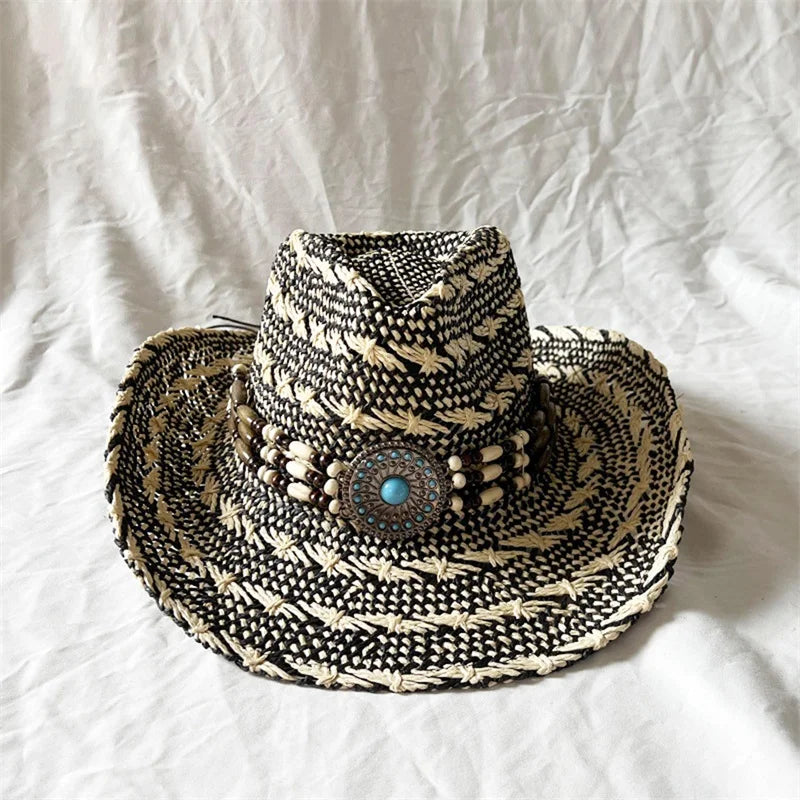 Woven hat with decorative elements on a white fabric background