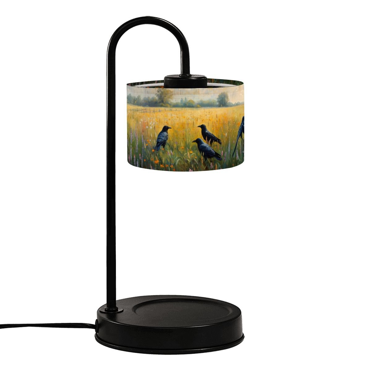 Table lamp with a cylindrical shade featuring birds in a field design on a white background