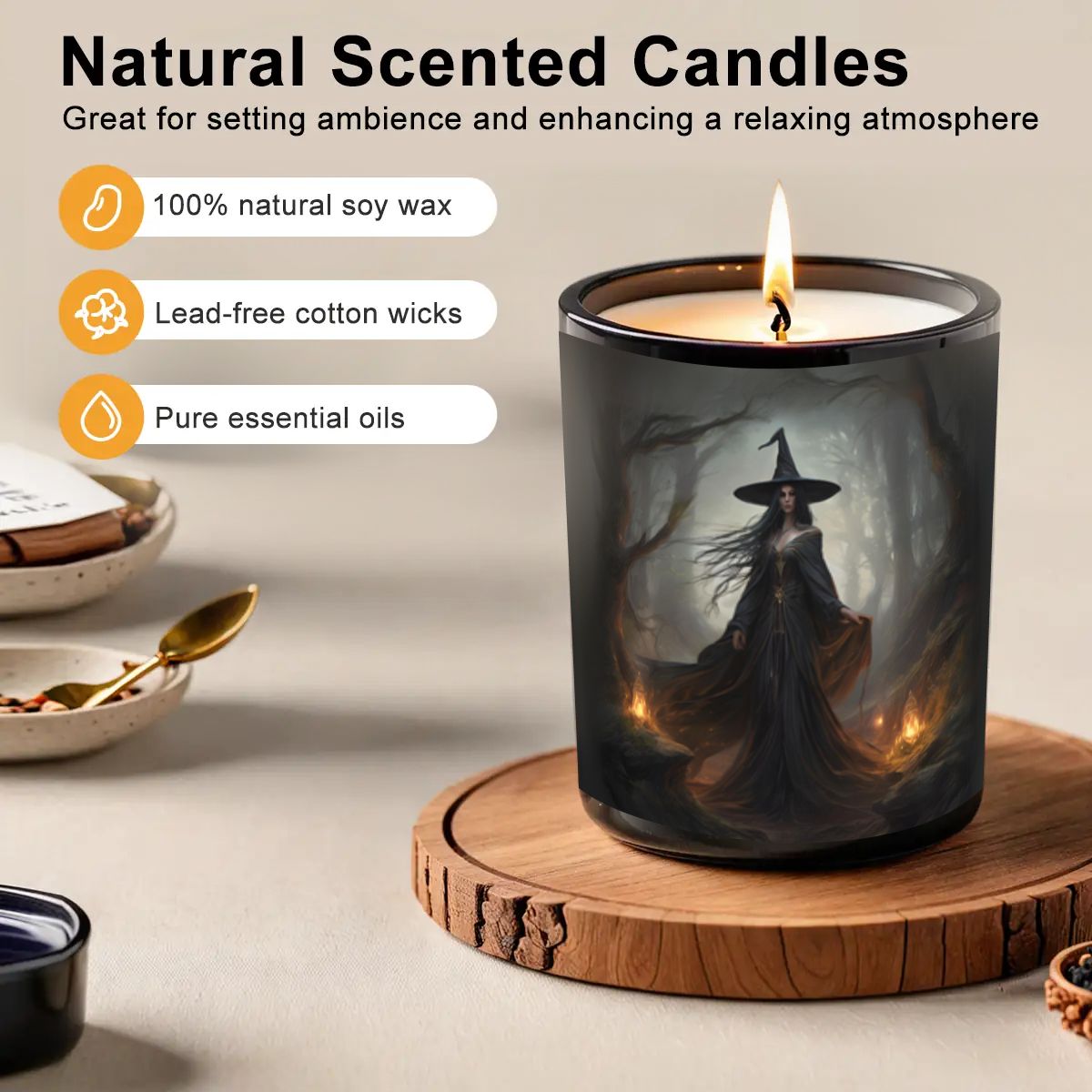 Candle with witch design on a wooden coaster, surrounded by decorative items.