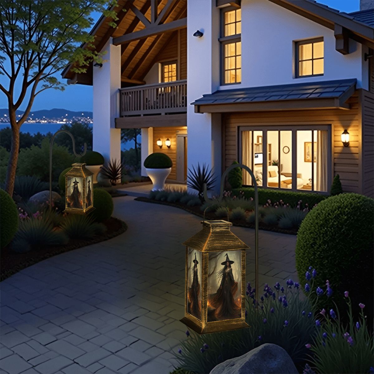 Evening view of a house with illuminated windows and decorative lanterns in a garden.