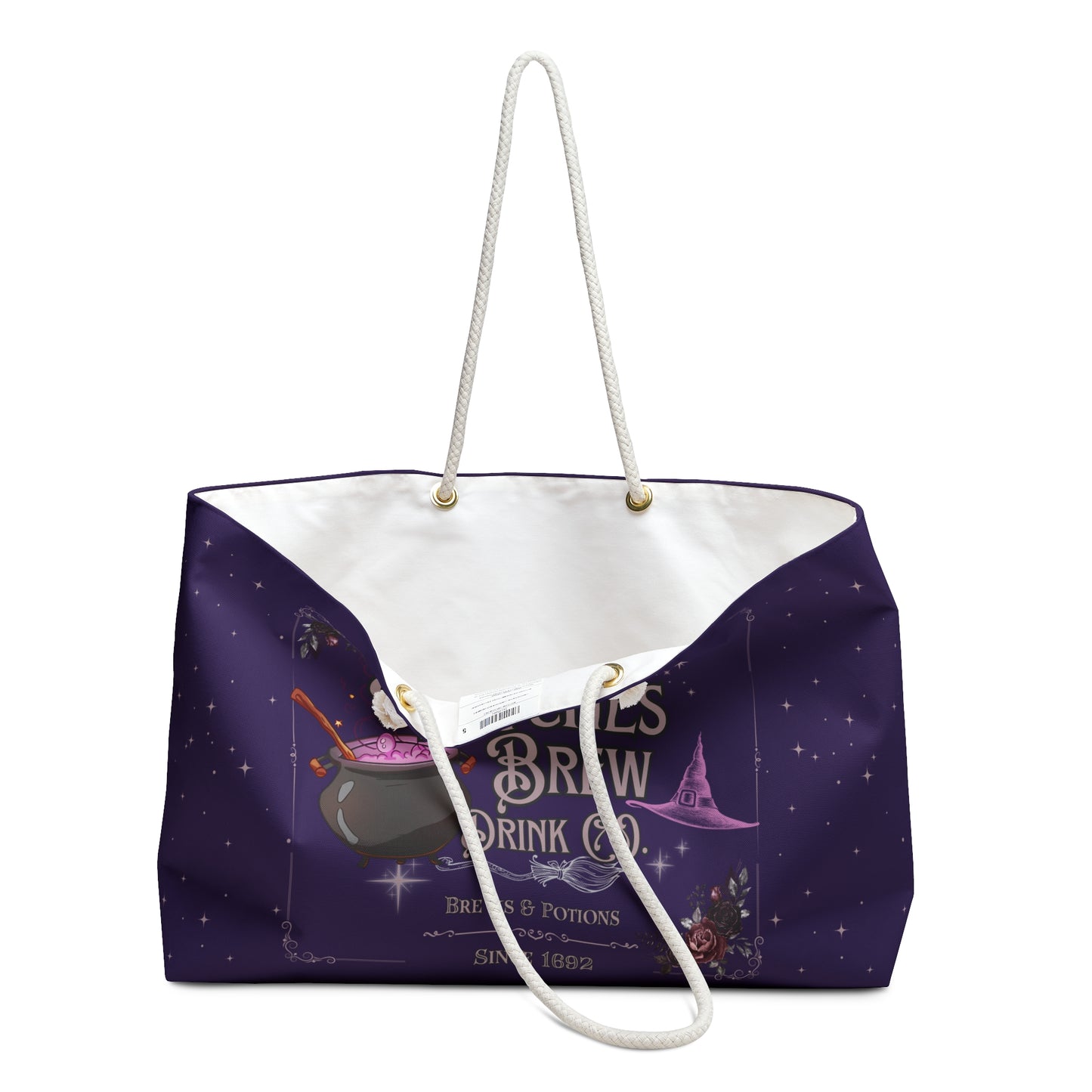Purple tote bag with white handle featuring a witch-themed design on a white background