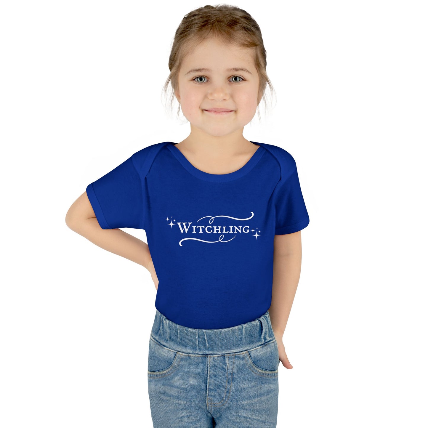 Child wearing a blue t-shirt with 'Witchling' text on a white background