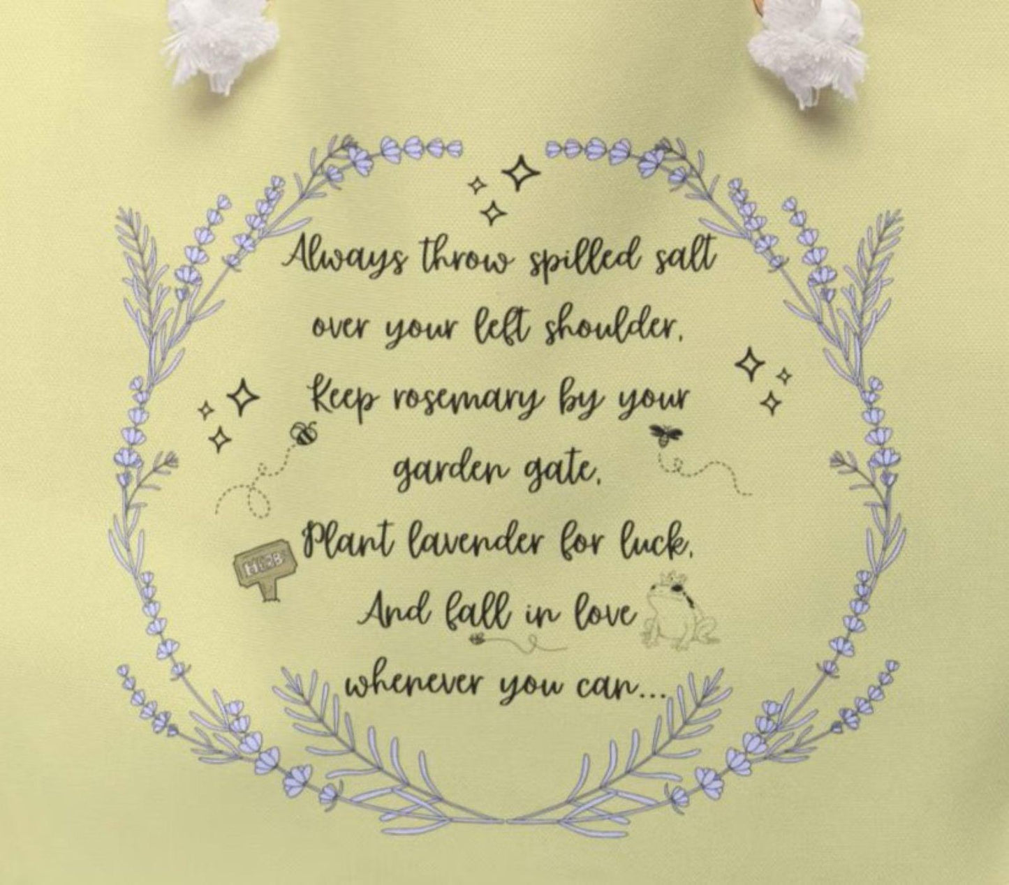 Decorative text with floral elements on a yellow background