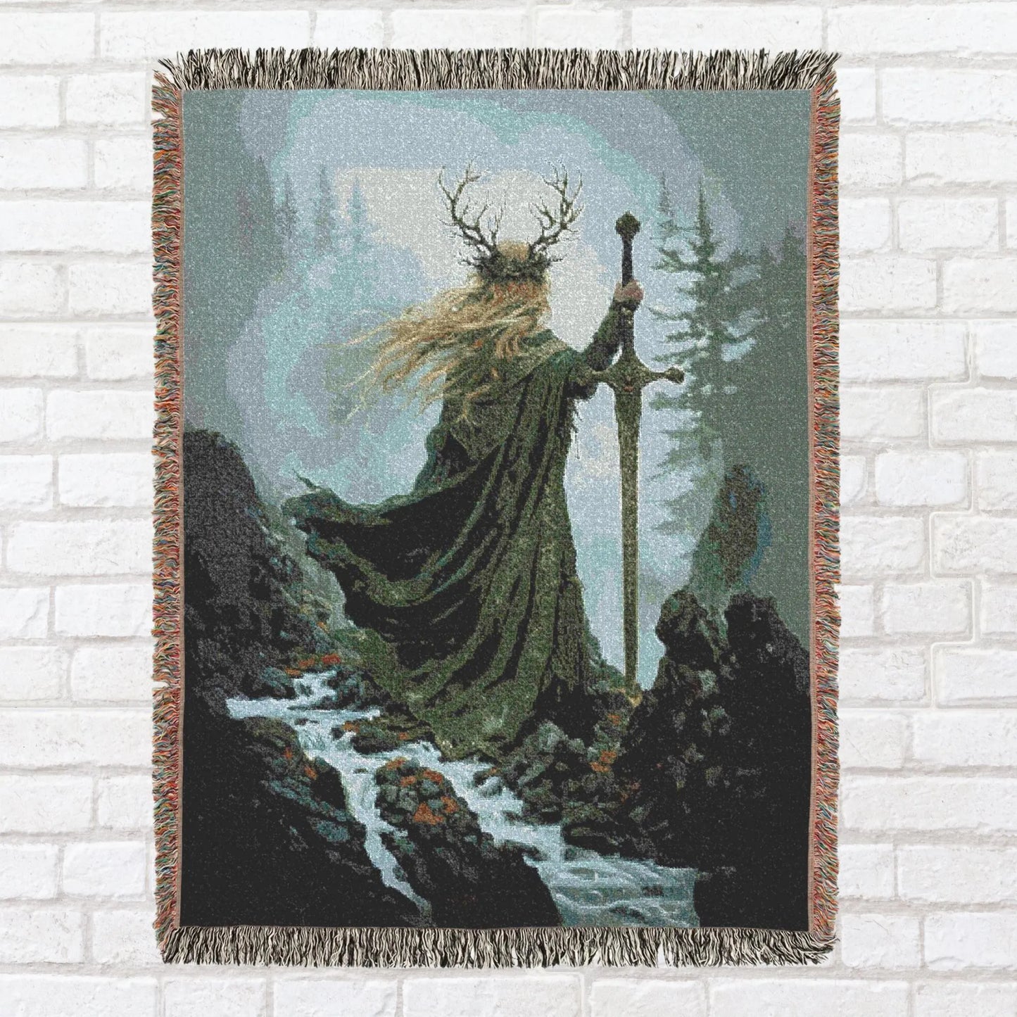 Woven tapestry of a figure in a fantasy setting with a sword and cloak, draped over a brick wall.