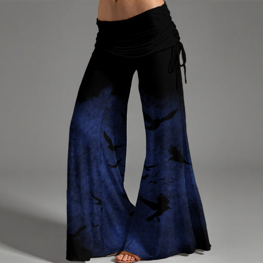 Black and blue wide-leg pants on a gray background