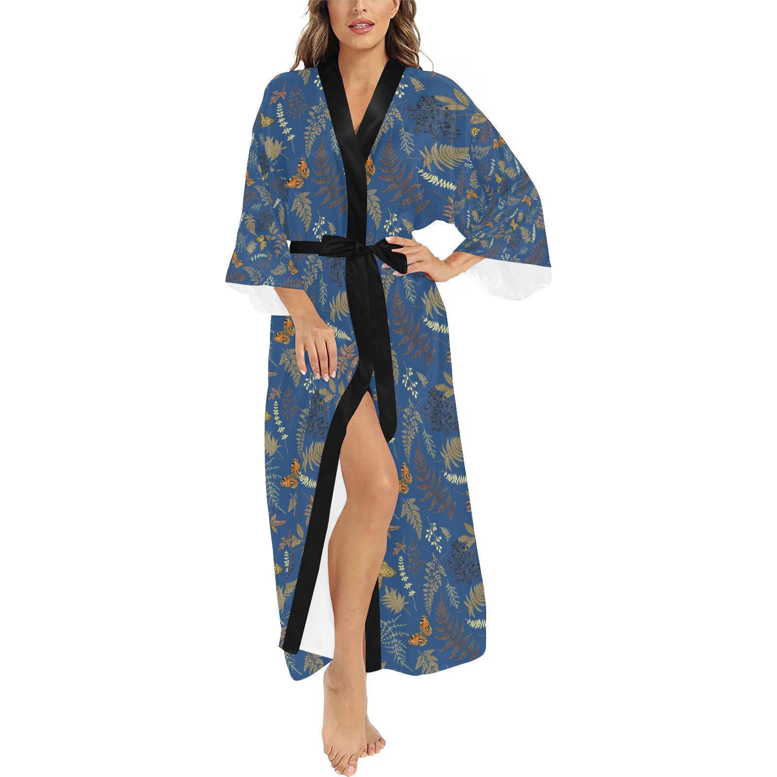 Woman wearing a blue floral kimono-style robe on a white background