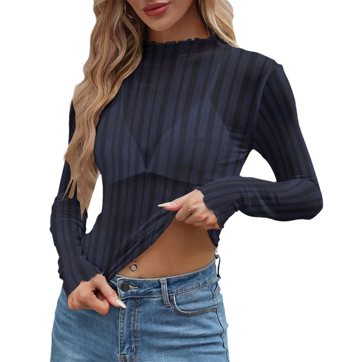 Woman wearing a black ribbed long-sleeve top and blue jeans on a white background