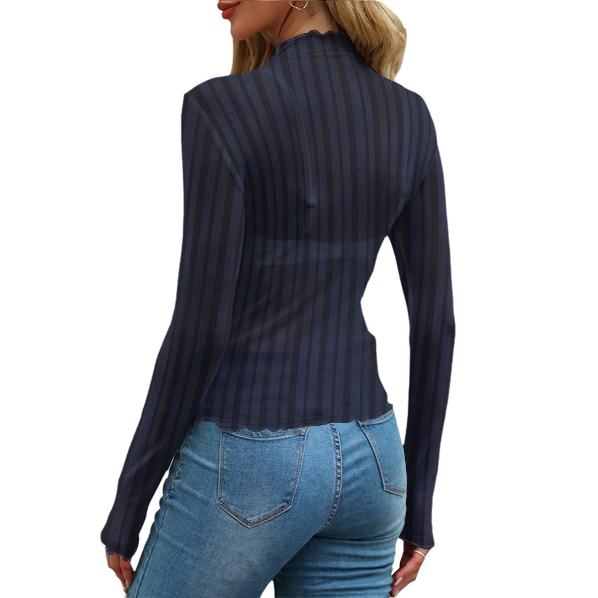 Woman wearing a navy pinstripe blouse and blue jeans on a white background