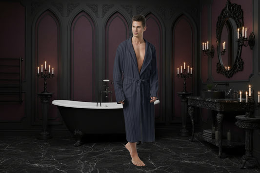 Man wearing a dark blue striped robe on a white background