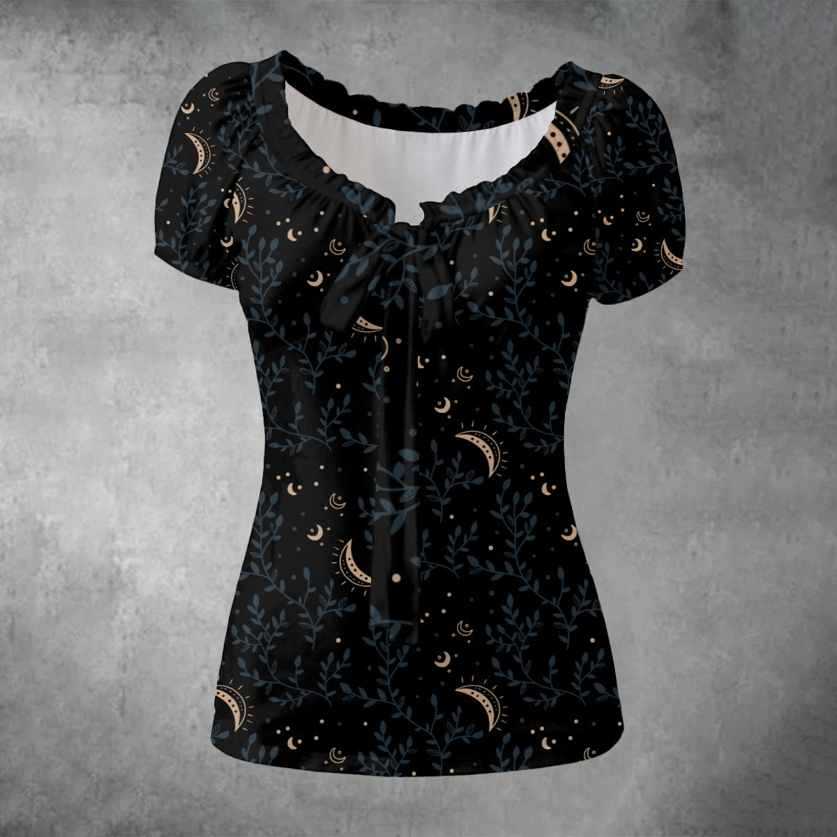 Black blouse with moon phase pattern on a gray background