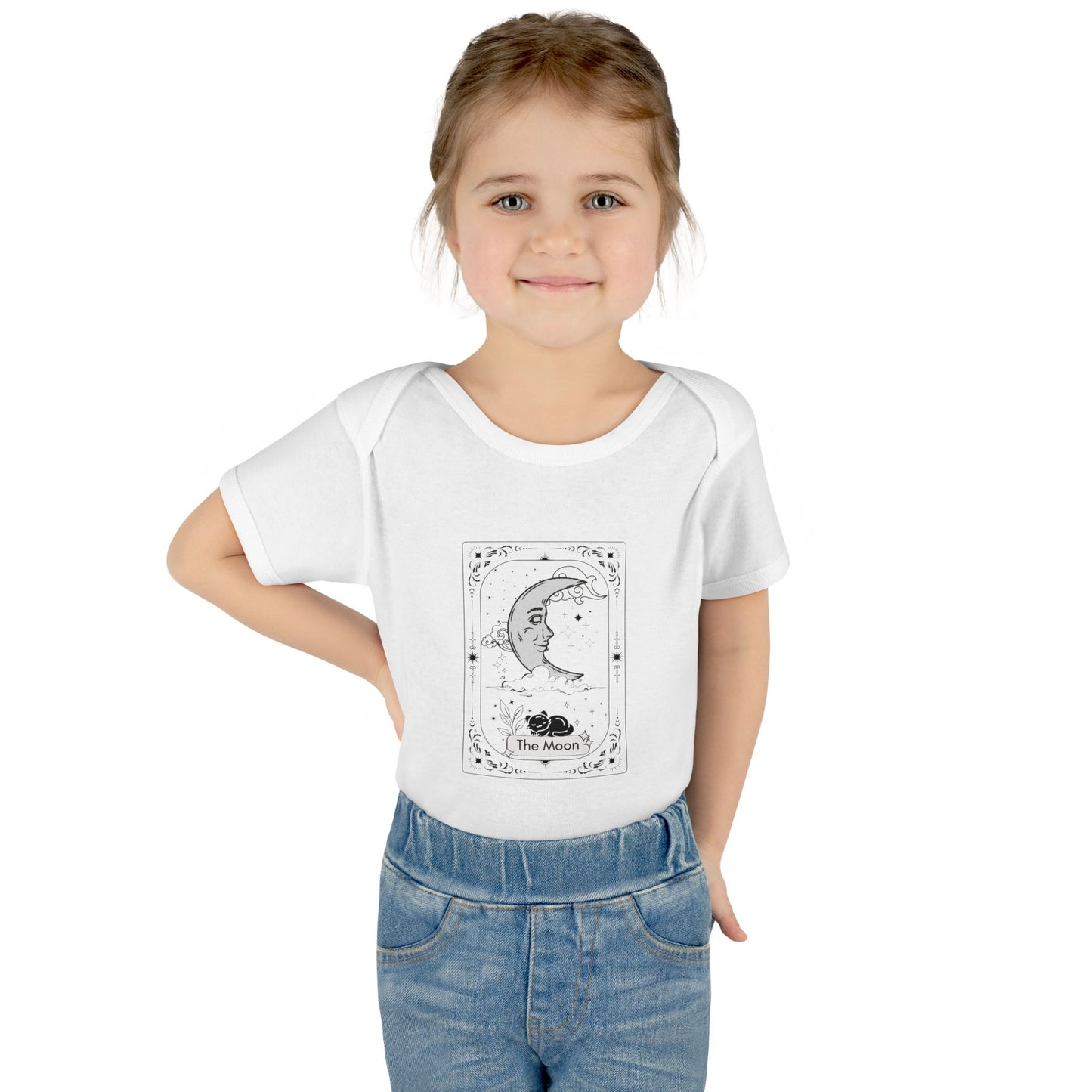 Young girl wearing a white t-shirt with a graphic design on a white background