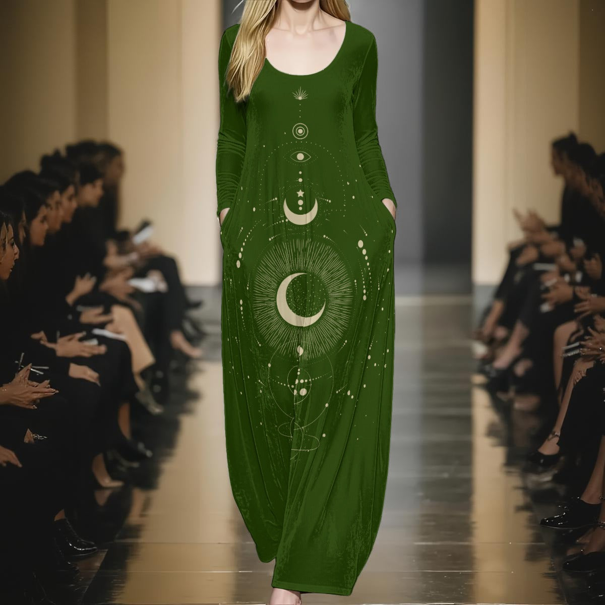 Model wearing a green dress with celestial design on a runway