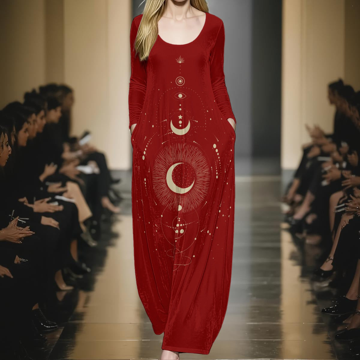 Model wearing a red dress with celestial design on a runway