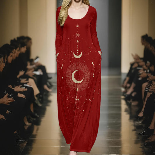 Model wearing a red dress with celestial design on a runway