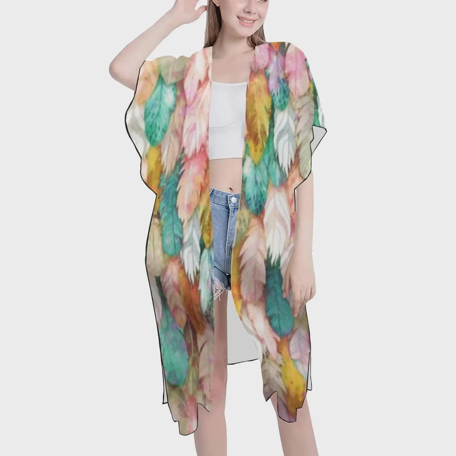 Woman wearing a colorful floral kimono-style garment on a white background