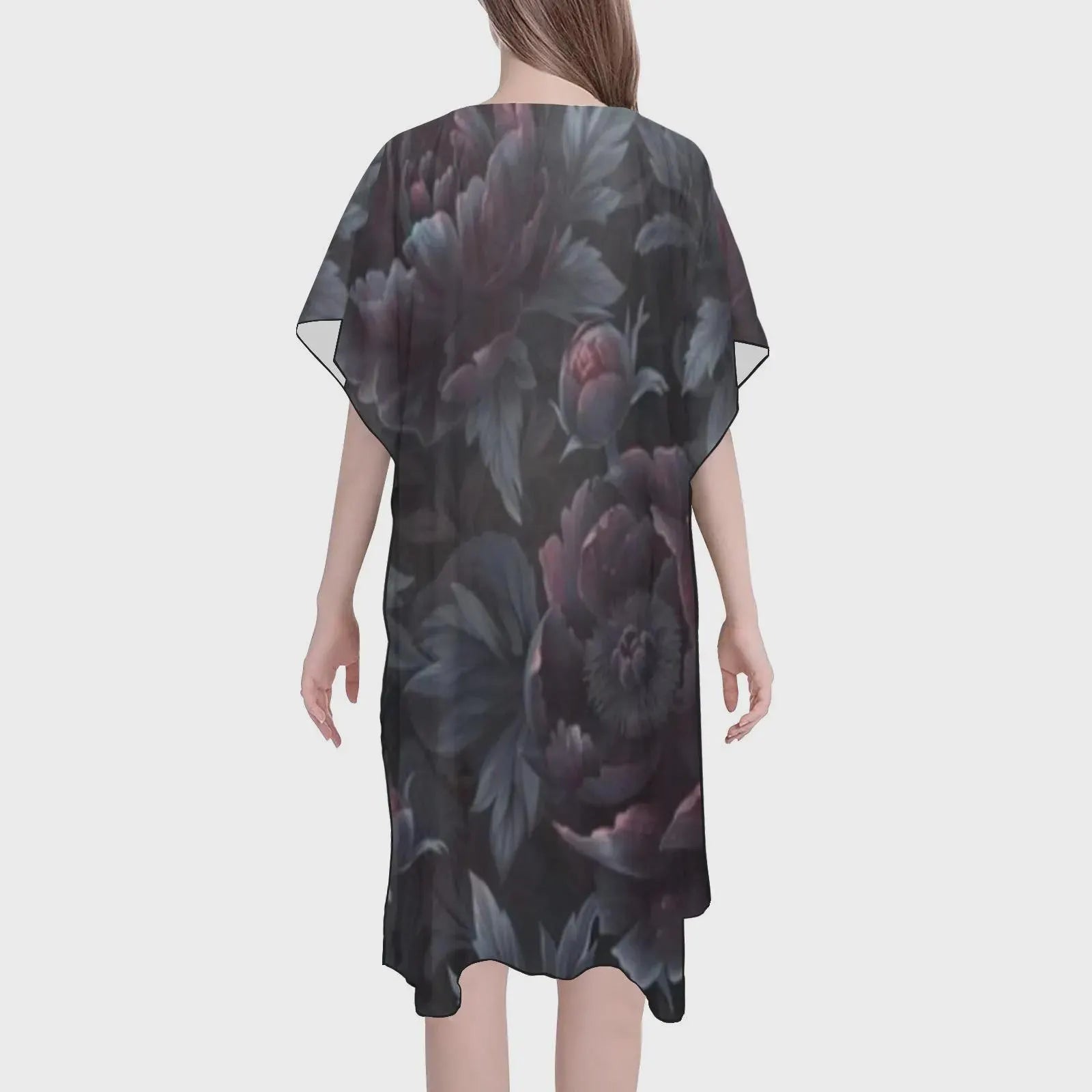 Floral patterned dress on a white background