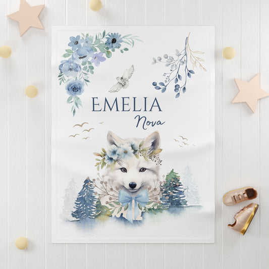 Blanket with a fox illustration and floral elements on a white background