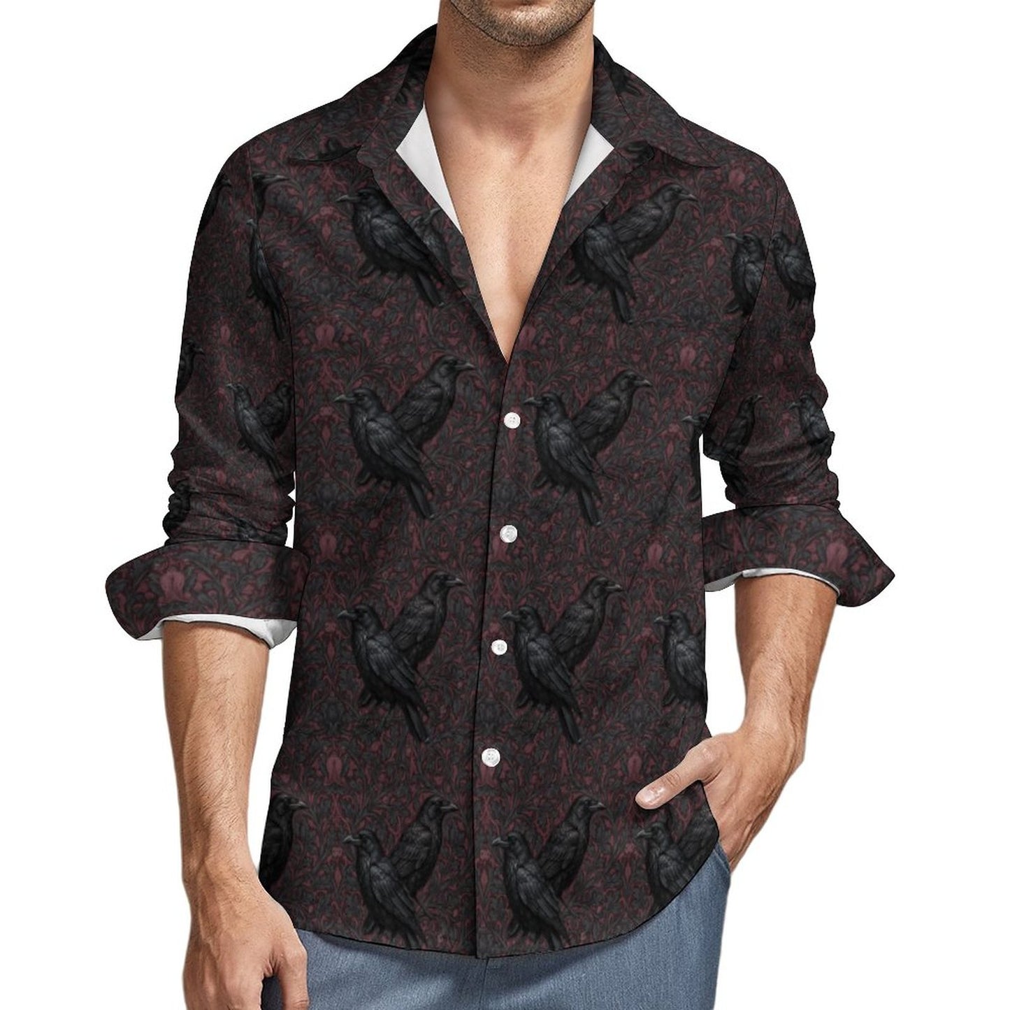 Man wearing a dark shirt with black crow pattern on a white background