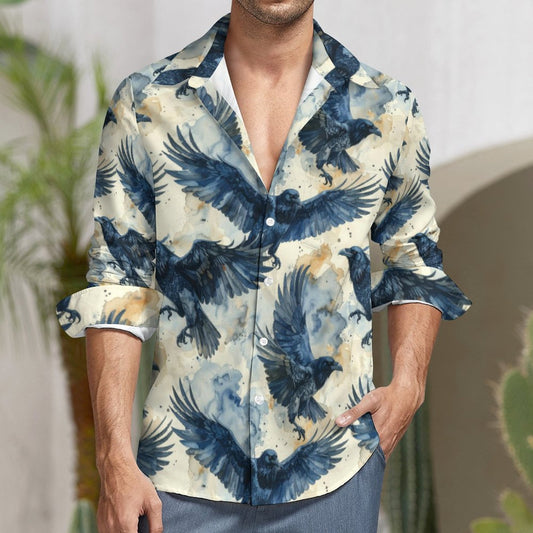 Man wearing a shirt with blue eagle pattern in an outdoor setting