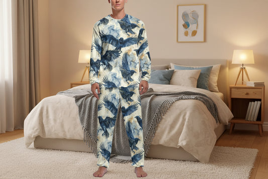 Person wearing a matching pajama set with blue and beige eagle pattern on a white background