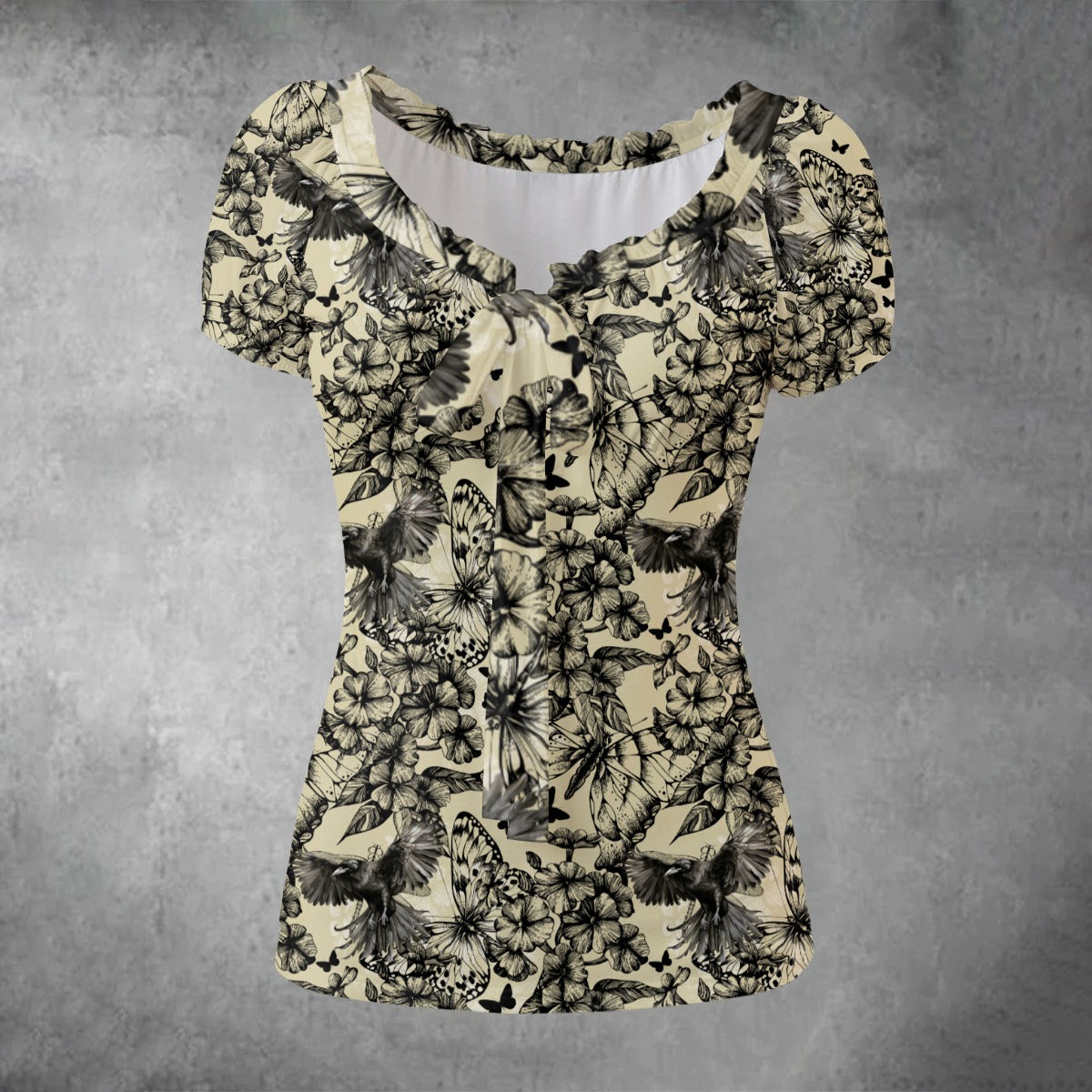 Floral patterned top on a textured gray background
