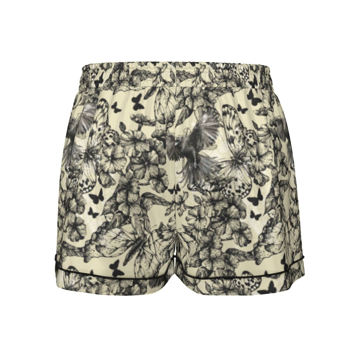 Floral and butterfly patterned shorts on a white background