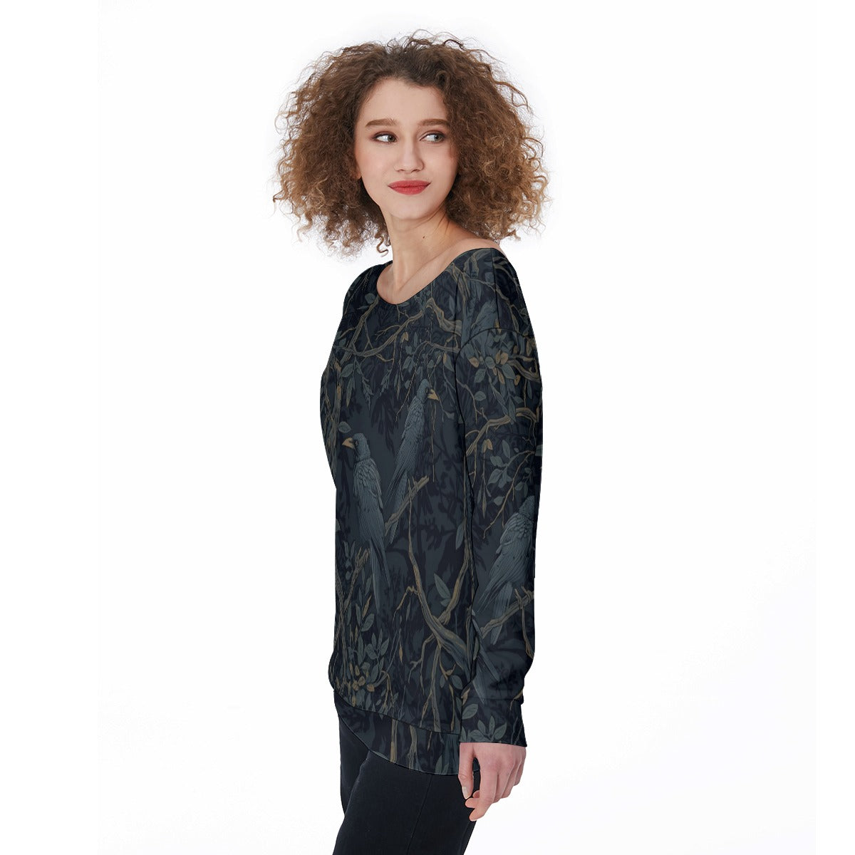 Woman wearing a dark patterned long-sleeve top on a white background