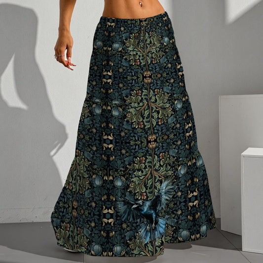 Long patterned skirt with butterfly design worn by a person against a neutral background