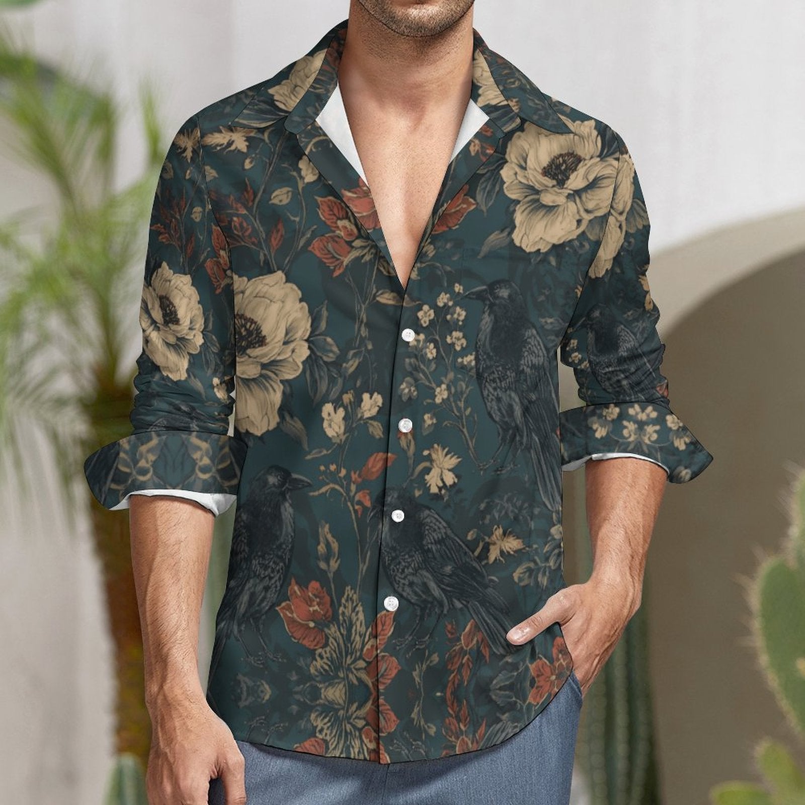 Man wearing a floral patterned shirt with a blurred background
