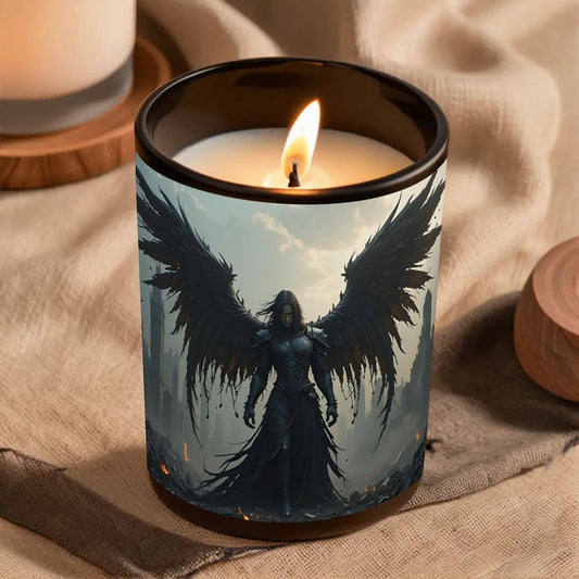 Candle with an angelic design on a fabric surface