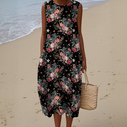Woman in a floral dress on a beach holding a straw bag