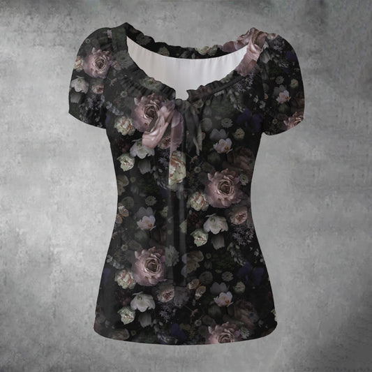 Floral patterned top on a textured gray background
