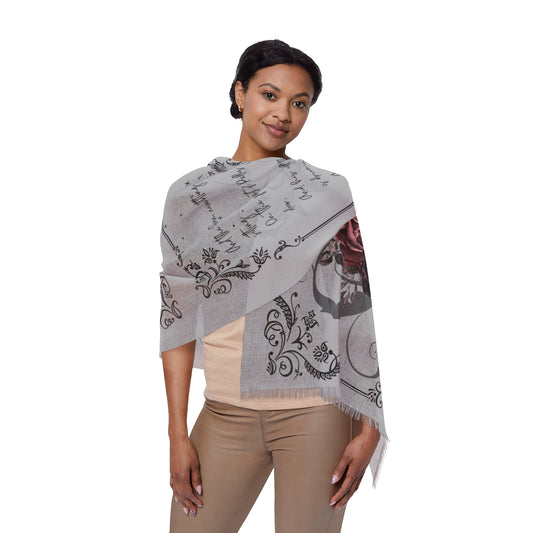 Woman wearing a gray patterned scarf on a white background
