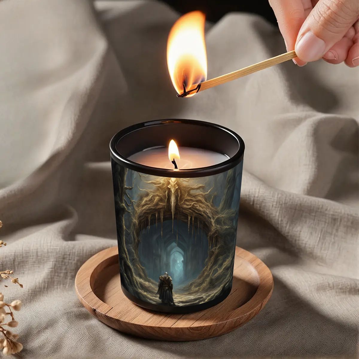 Candle being lit with a match on a textured fabric background