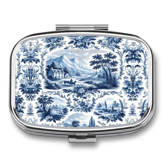 Compact mirror with blue and white landscape design on a white background