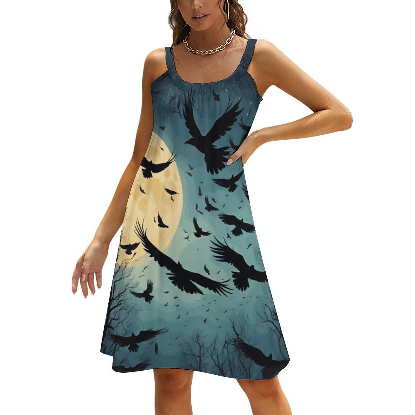 Dress with bird and moon design on a white background