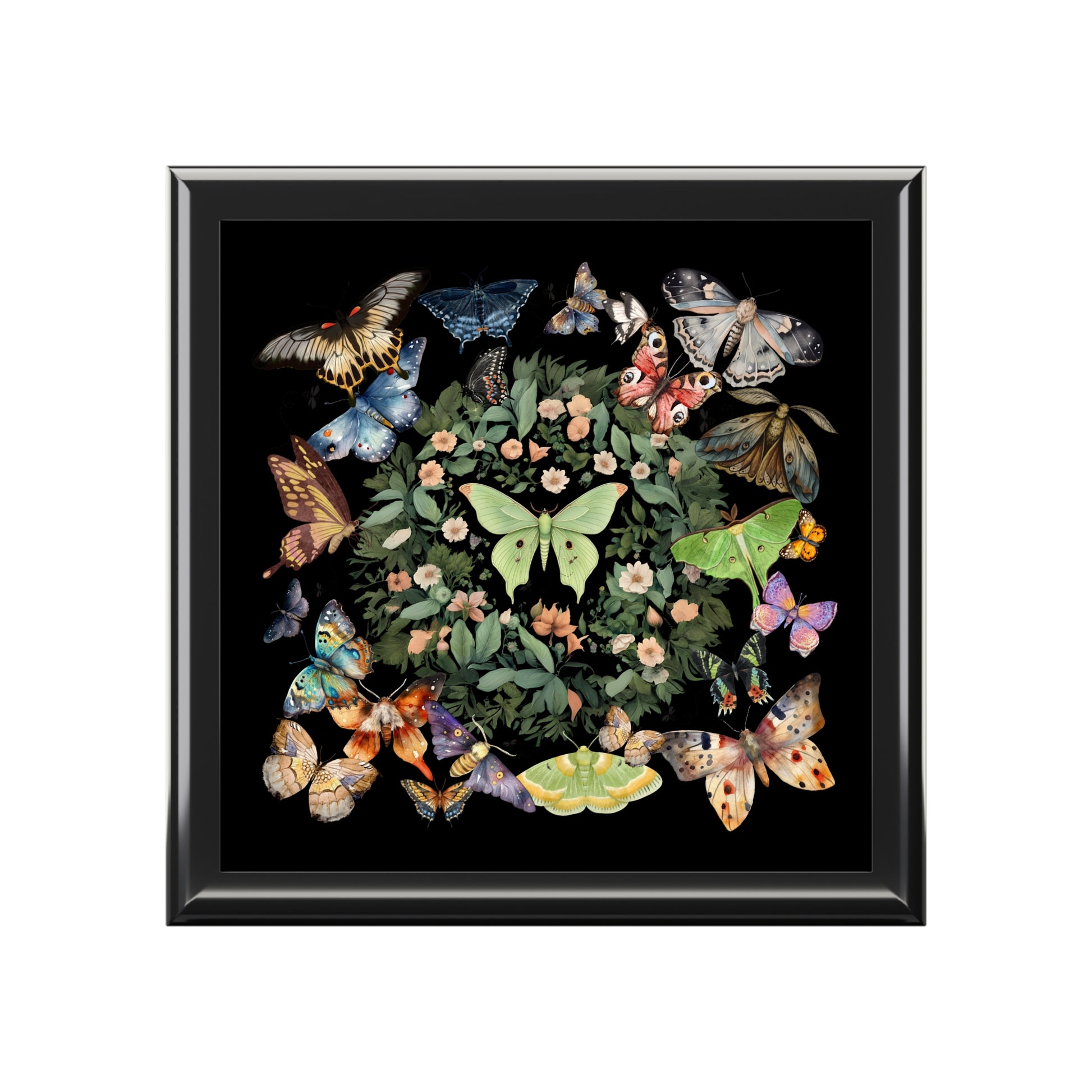 Framed artwork with colorful butterflies and flowers on a black background