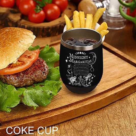 Black tumbler with 'Midnight Margaritas' design next to a burger and fries on a wooden surface.