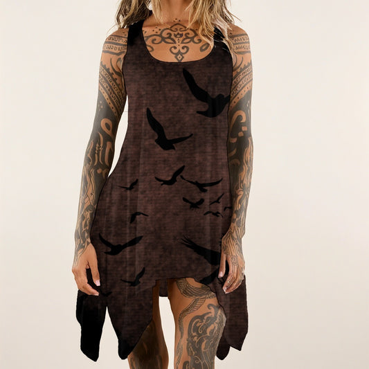 Person wearing a brown dress with black bird patterns on a plain background