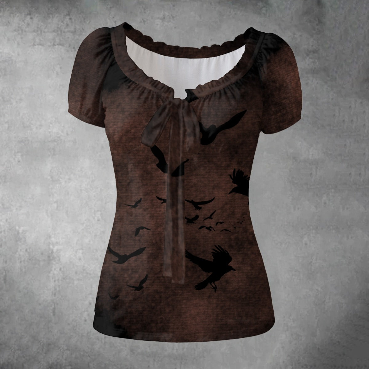Brown blouse with black bird patterns on a gray background