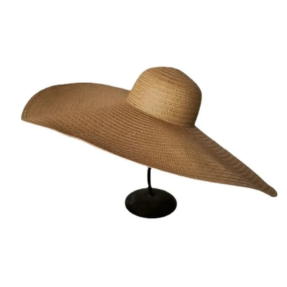 Wide-brimmed straw hat on a white background