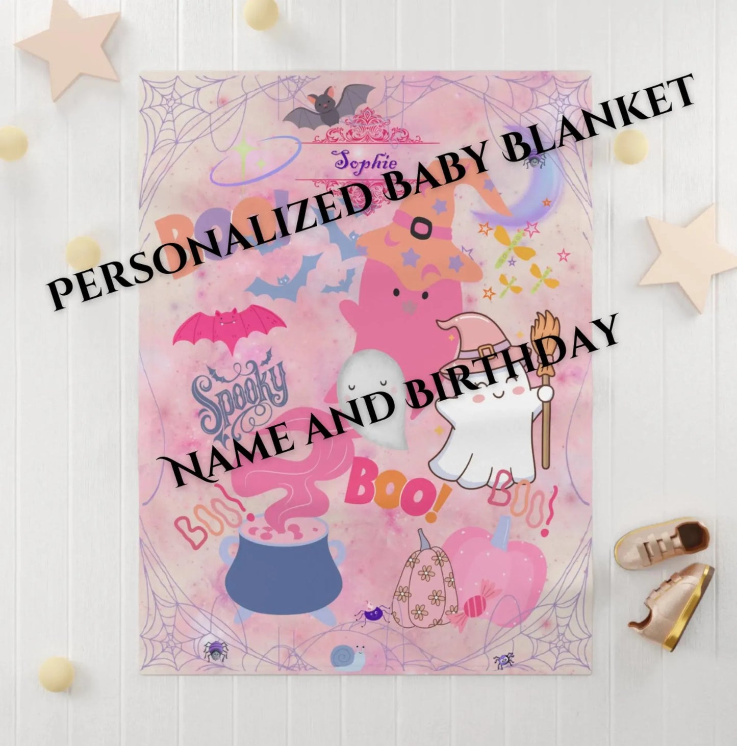 Personalized baby blanket with Halloween-themed design on a white background