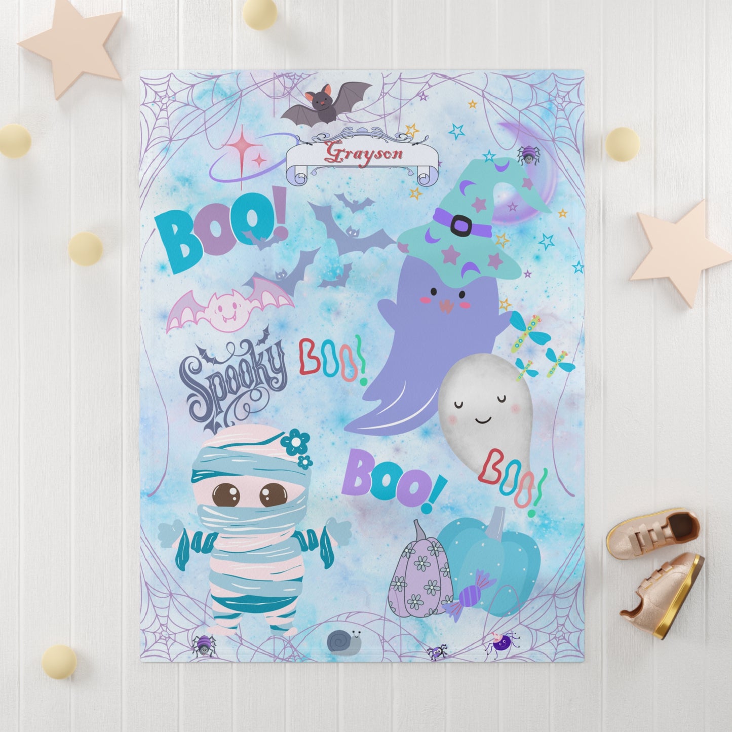 Children's Halloween-themed poster with cartoon characters on a light blue background.