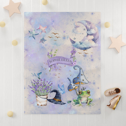 Children's poster with a frog, witch hat, and lavender flowers on a pastel background.