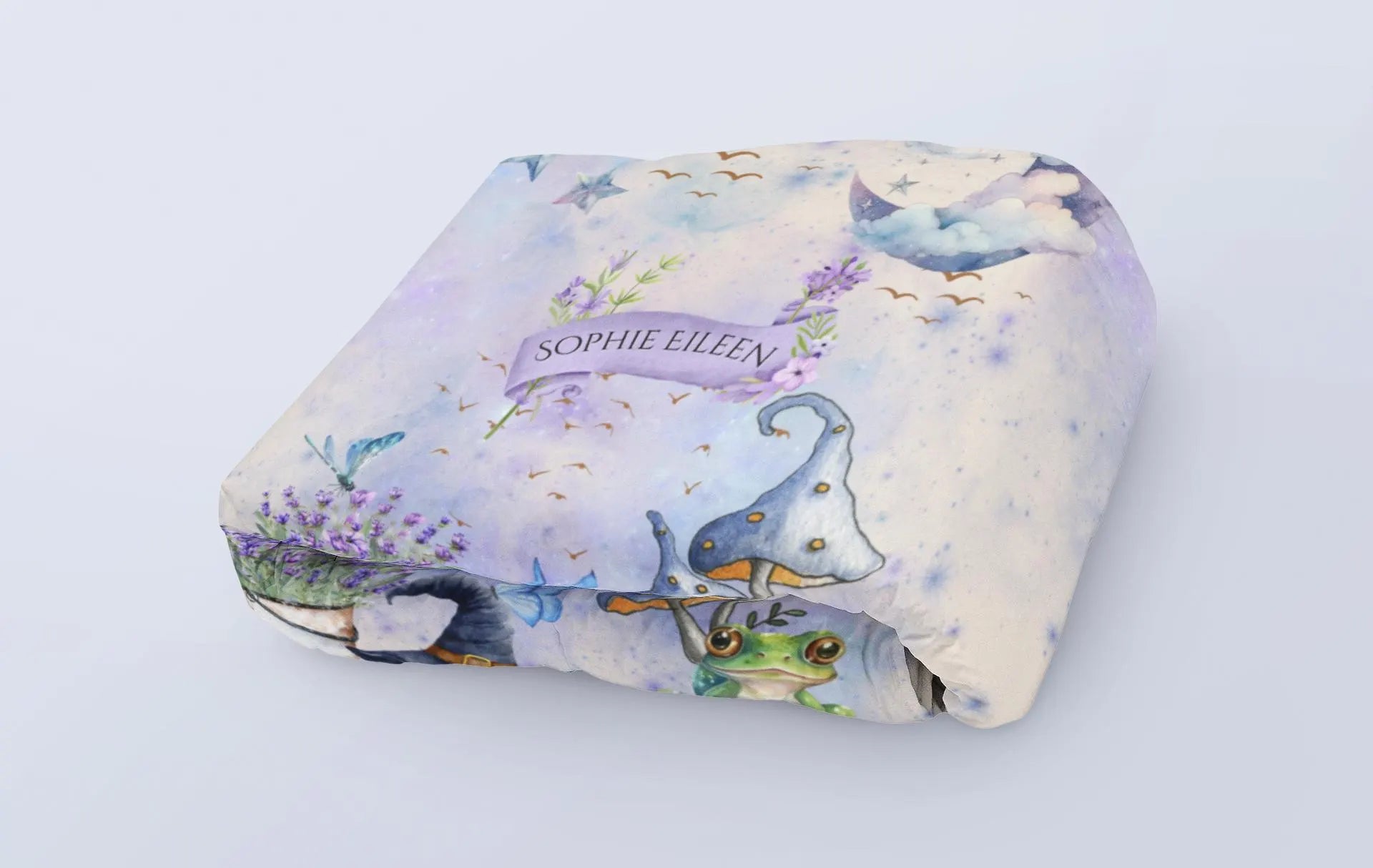 Floral-patterned blanket with 'Sophie Eileen' branding on a light gray background